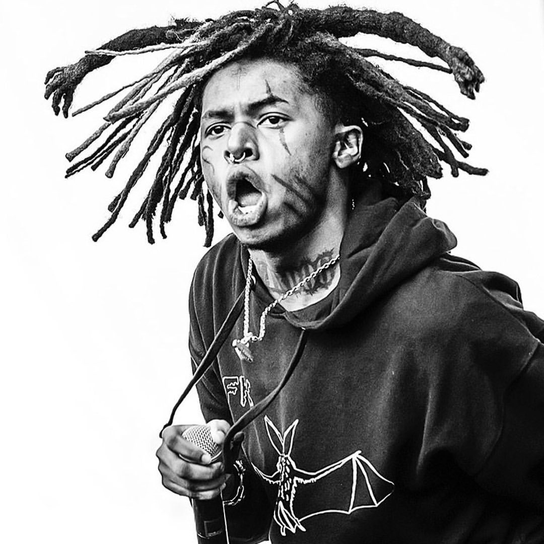 Black and white picture of Zillakami from City Morgue wearing an FFK Bat Hoodie