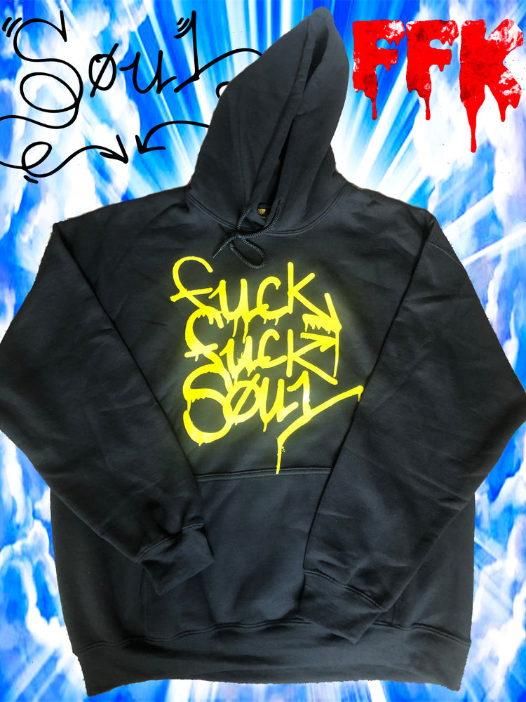 This image features a striking black hoodie from the VULC SOUL x FFK collection. The hoodie displays a prominent, eye-catching design with the word "Fvck Fvck Soul" in stylized yellow lettering, creating a bold contrast against the dark fabric.