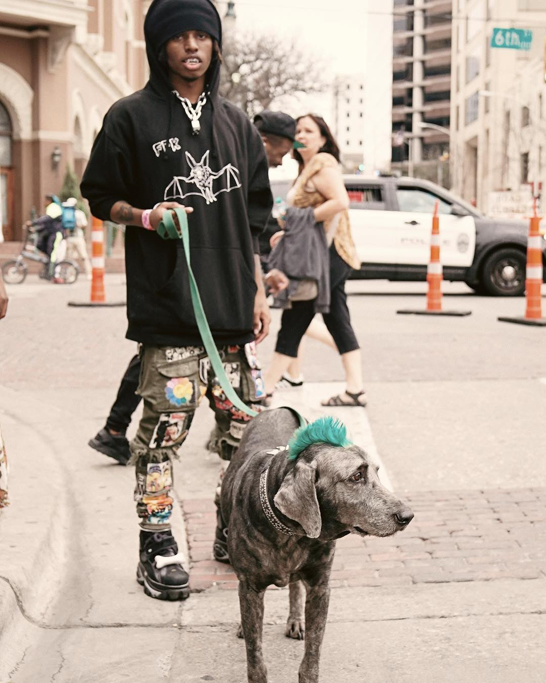 Zillakami with punk dog on the street in a FFK Bat Hoodie